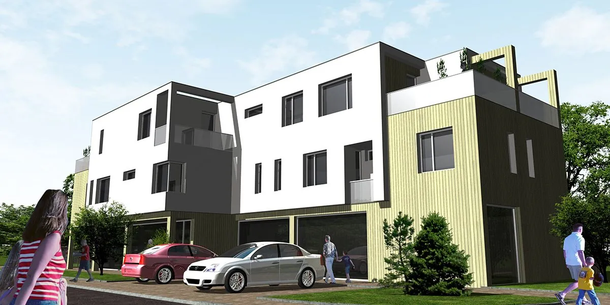 Ein dreistöckiges Mehrfamilienhaus auf einem Eckgrundstück in einer Vorortstraße, weißer Putz mit olivgrüner vertikaler Holzverkleidung, Garagen im Erdgeschoss, am Bordstein geparkte Autos und vorbeigehende Menschen. Eine Grundstücksdichte, die ein Bebauungsplan nur in ausgewiesenen Nutzungszonen zulässt.